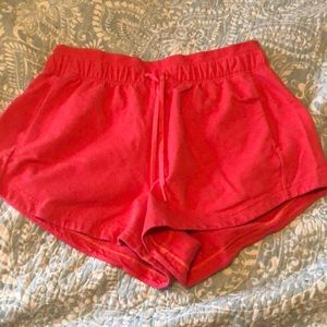 Red Lululemon shorts